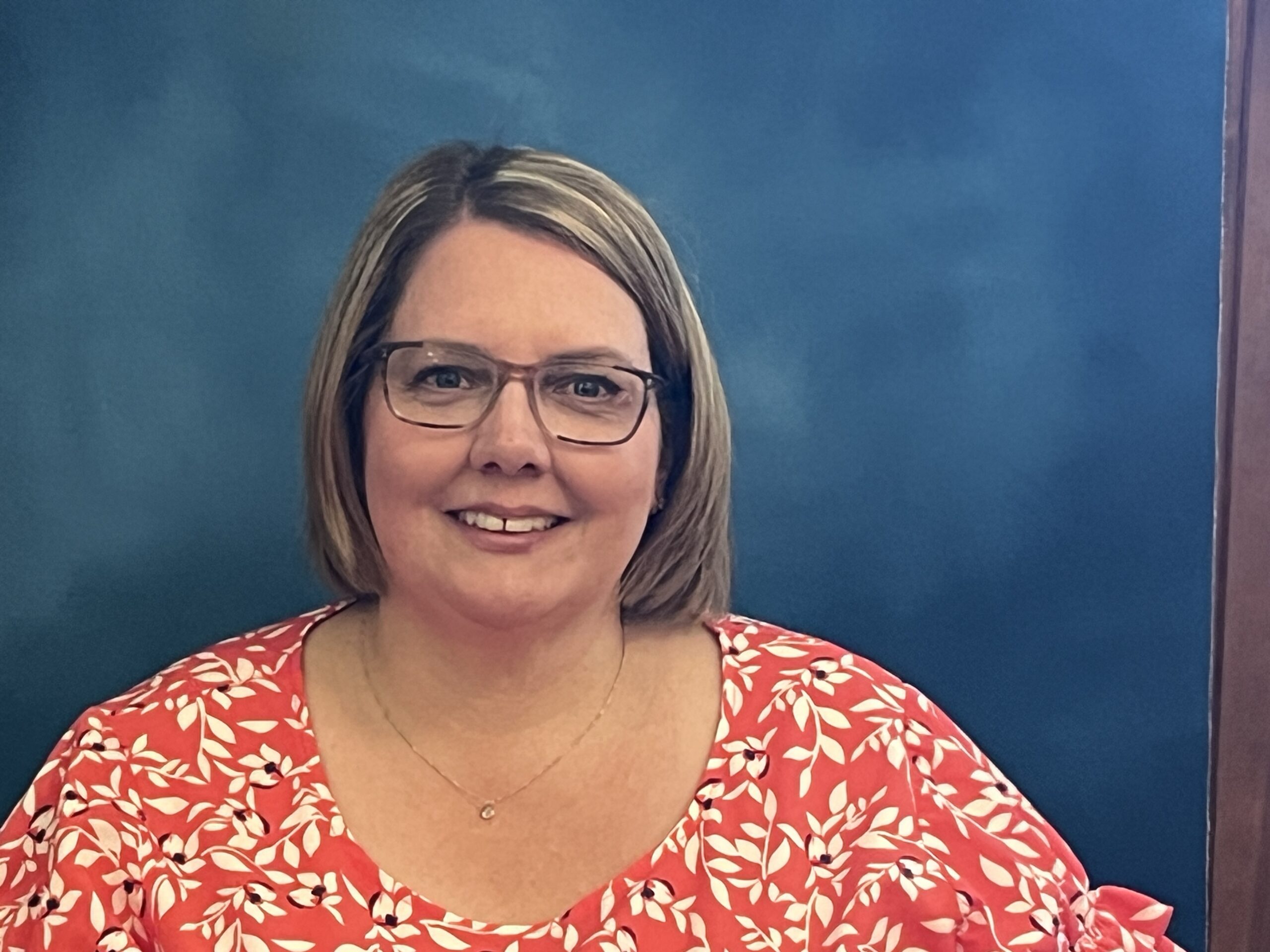 this is a photo of julie stuvland, the registrar and counseling secretary at sisters high school